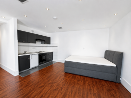 Hauptbild Modernes Apartment mit Einbauküche und heller Fensterfront